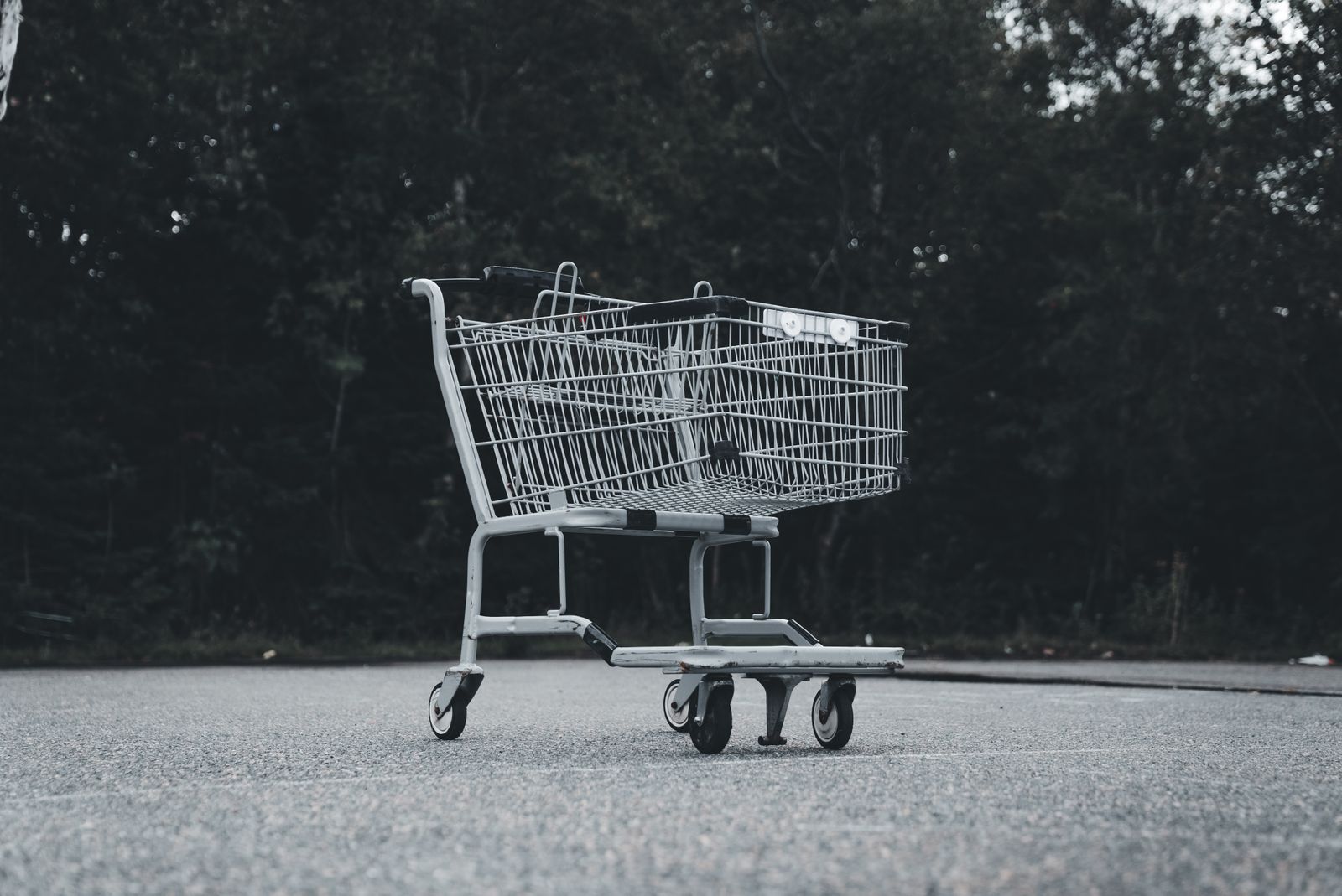 Abandoned shopping cart on empty street