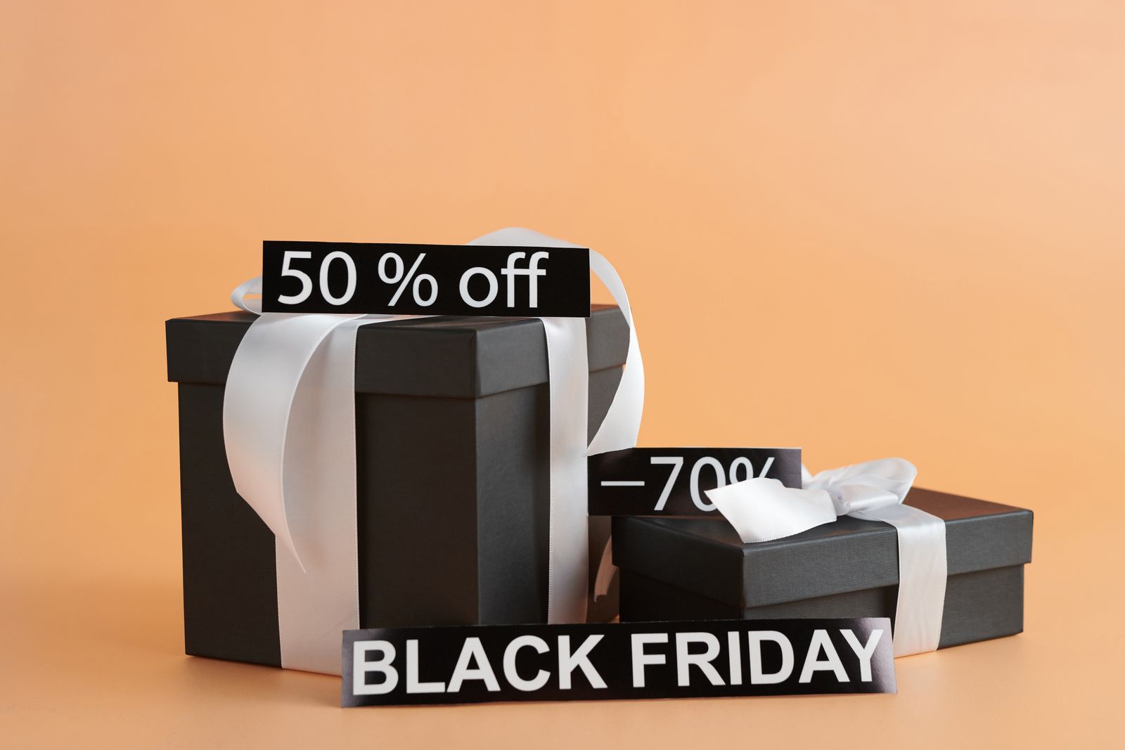 Black gift boxes with discount signs